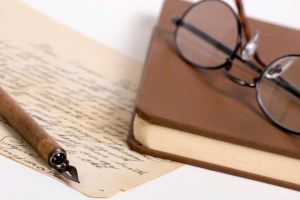 Letter with pen and glasses 1